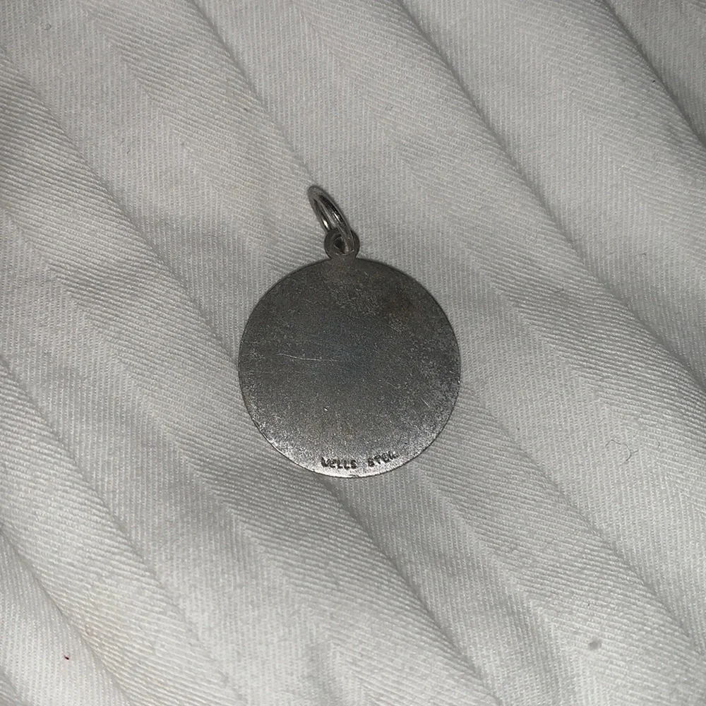 Vintage “Nota Benes” sterling silver (by Wells Sterling Co.) charm stamped